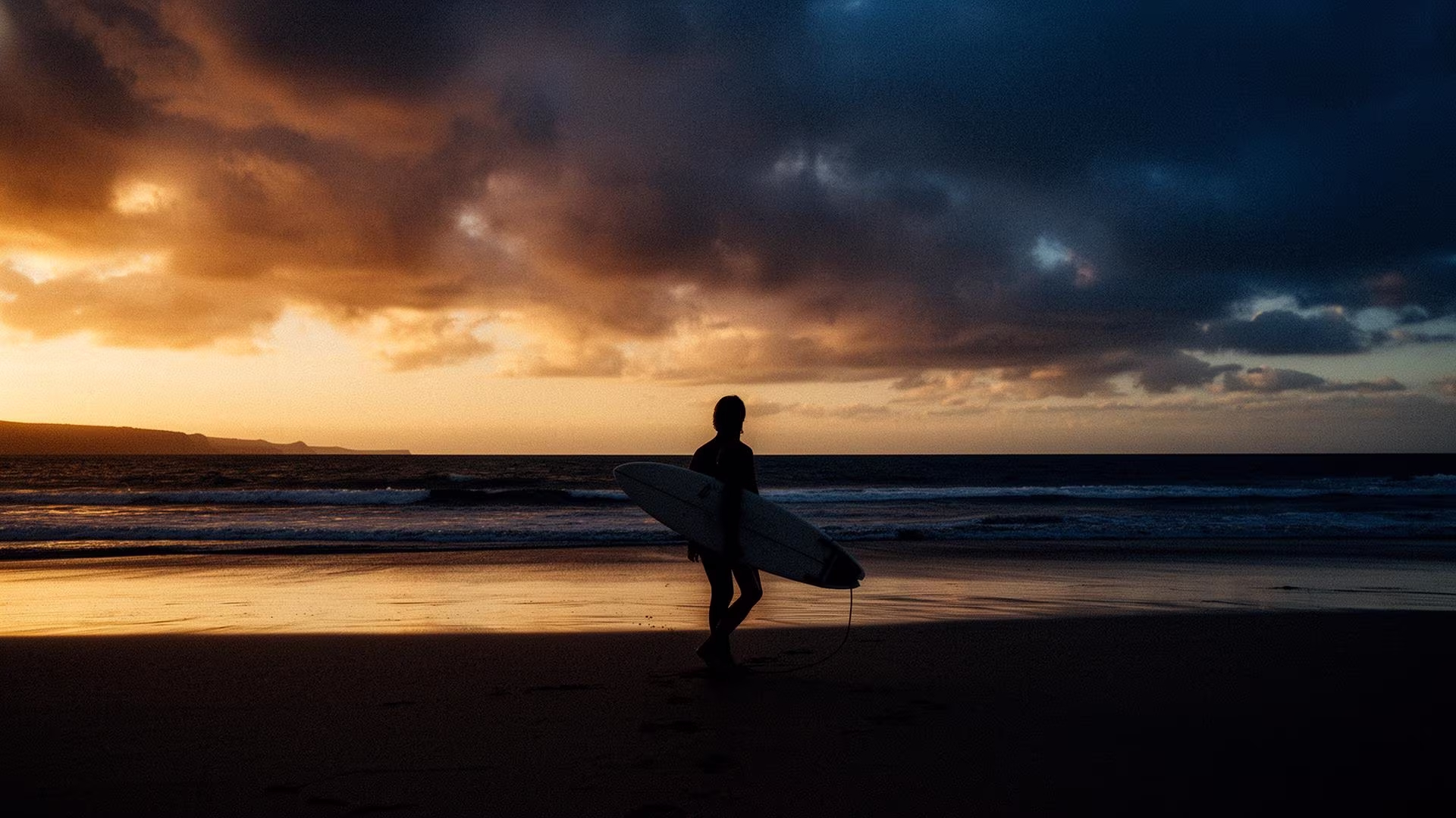 Surfer at sunset in Baleal